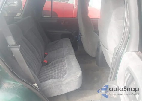 1999 Chevrolet Blazer Ls z USA, uszkodzony, nr VIN 1GNDT13W7XK133052